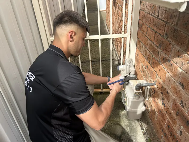 A gas appliance connection being tested and certified